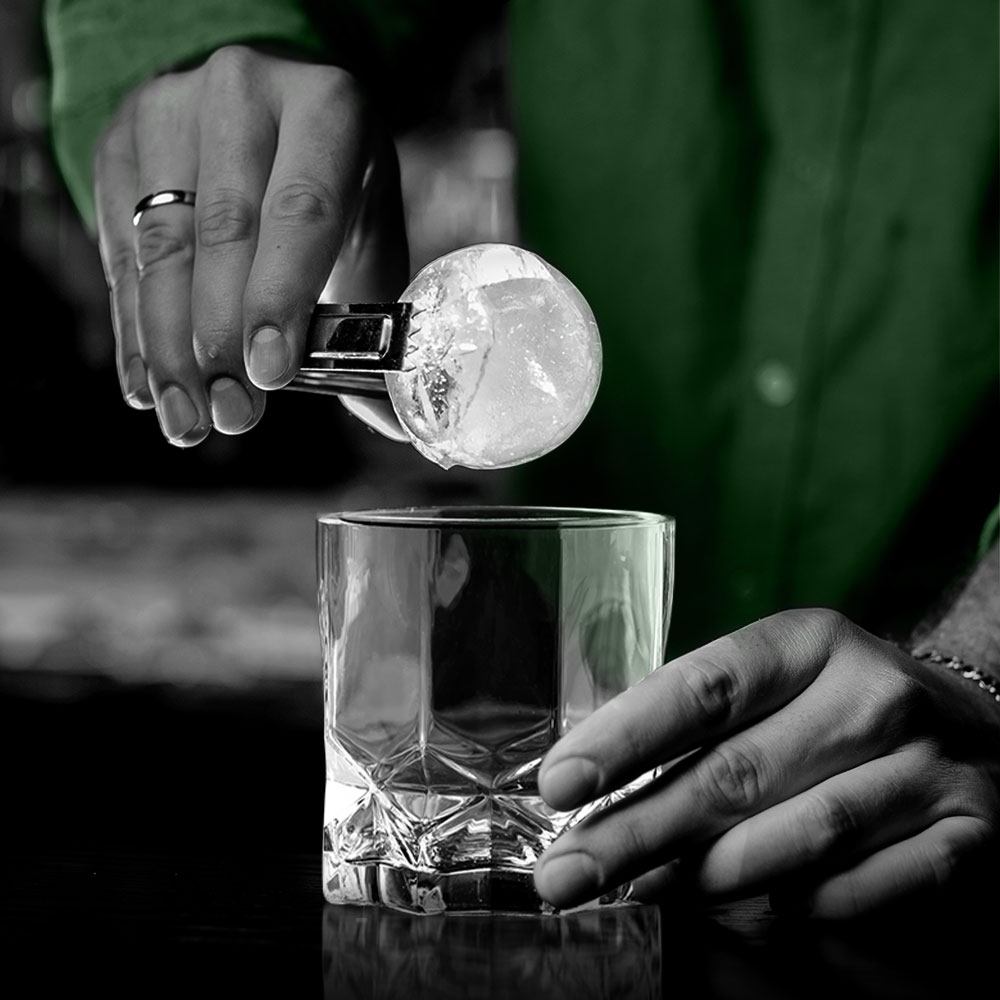 bartender making a drink with oaksmith gold