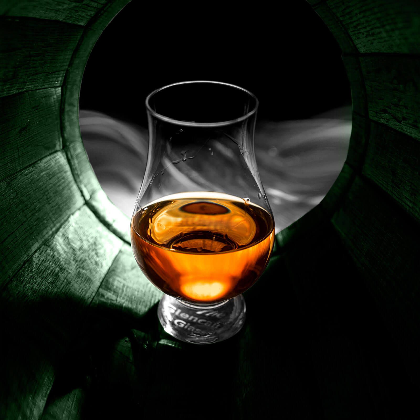 oaksmith international in a barrel glass with oaksmith internationalinside a barrel